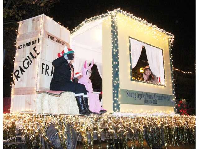 the float is decorated with lights and decorations