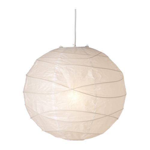 a white ball shaped light hanging from a ceiling