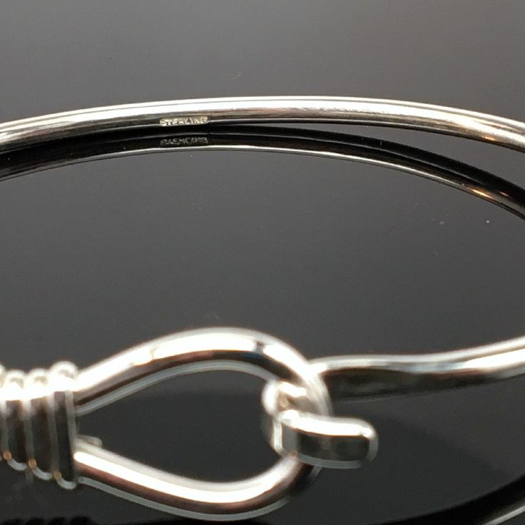 "This sterling silver Lasso Bangle is available in two finishes, sterling silver and sterling silver with 14k gold vermeil. The bangle accommodates medium and large spacer beads and traditional charms. \"Sterling\" is inscribed on the inside of the band. Brand new condition. Made by Brown County Silver. Comes in small, medium, and large sizes. Small - 6.5\" Medium - 7.25\" Large - 8\" Approximate weight is 9.7 grams See more @ https://www.etsy.com/shop/brocosi" Adjustable Cuff Bracelet With Sterling Silver Clasp, Adjustable Round Cuff Bracelet With Sterling Silver Clasp, Nickel Free Sterling Silver Classic Bangle, Sterling Silver Clasp Bangle Bracelet, Sterling Silver Clasp Bangle For Gift, Nickel-free Sterling Silver Bangle Bracelet, Adjustable Bangle With Sterling Silver Clasp, Sterling Silver Bangle With Lobster Clasp, Classic Adjustable Sterling Silver Bangle