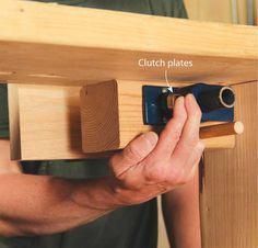 a man is working on a piece of wood that has been built into the wall