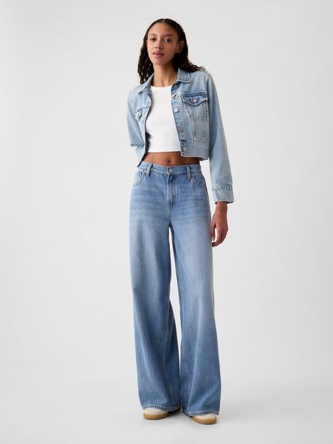 Fit:  A full-length, supersoft baggy jean that's fitted on the waist & relaxed all the way down.  ​ Fabric:  55% Cotton, 40% Tencel, 5% Recycled Cotton.  Stretch: No Stretch Jeans.  Authentic denim that gets better with every wear.  Made to wear all day & break in over time.  ​ Rise :  Mid Rise Jeans.  Look: A five-pocket baggy jean in a light or medium indigo wash.  ​ Details:  Zip fly & five-pocket styling.  Responsibly Made: This pair of denim is part of our water-saving Washwell program.  Compared with conventional wash methods, Washwell uses at least 20% less water and has saved over a billion liters of water since 2016.  Our Mid Rise Jean has a 10" 25 cm) rise. ​ Fitted at the waist and hip.  Loose, baggy through the leg.  Full-length jean.  Hits below the ankle. ​ 26" 66 cm) leg ope Style Wide Leg Jeans, Moda Denim, Baggy Jean, Jeans Look, Tall Jeans, Wide Jeans, Break In, Relaxed Fit Jeans, Women Denim Jeans