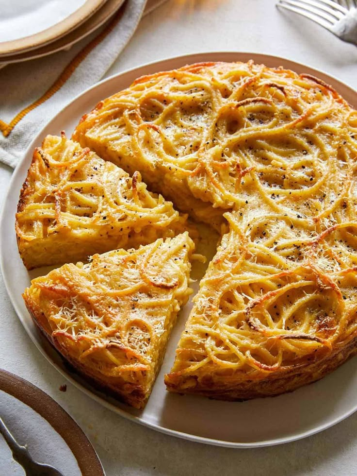 there is a pie on the plate with one slice cut out and ready to be eaten