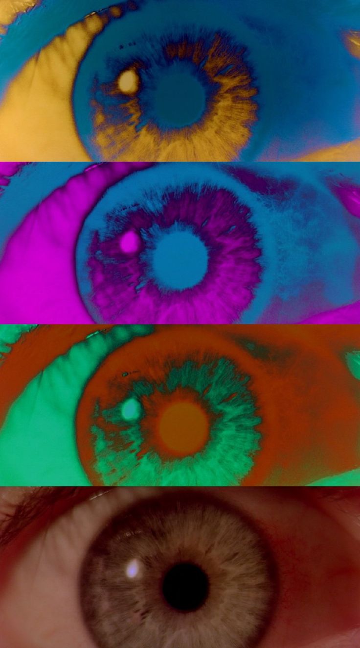 an eye with multiple colored irises in it's irise area, and the iris