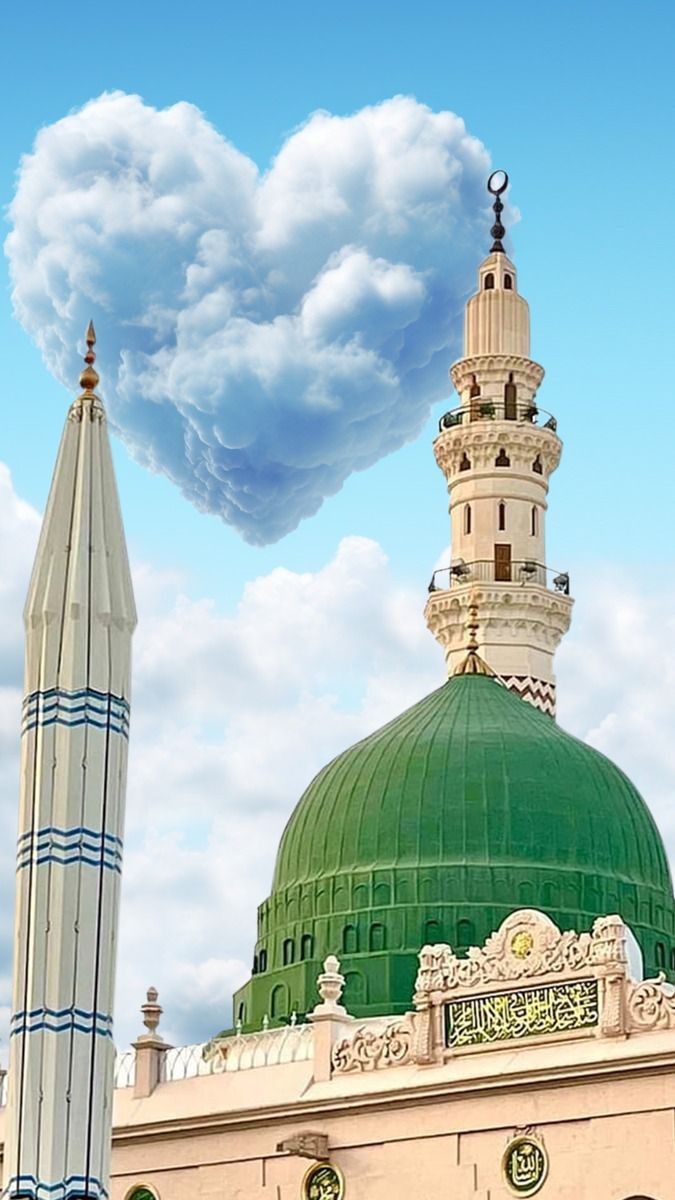 a large green dome on top of a building with clouds in the sky above it