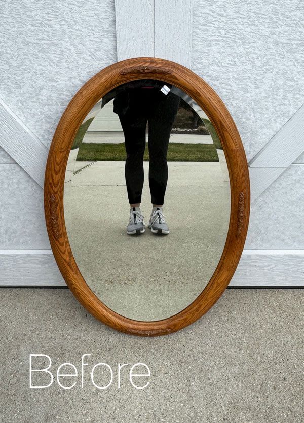 a person standing in front of a door with their reflection in a mirror that says before