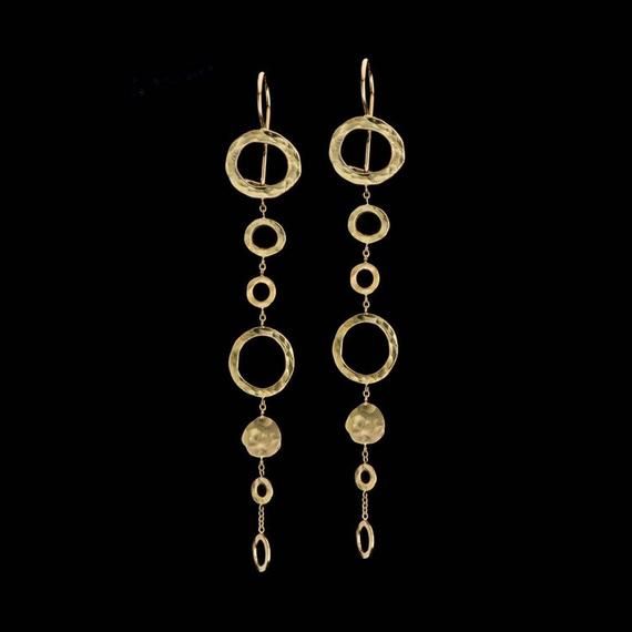 18k solid Gold Dangle Earrings, Delicate Mobile 18k Solid Gold Hammered Hoops on Chain earrings, fine jewelry Weight: 5.6g  (2.8g each earring)Length: 9.6cmWidth: 1.4cmAll earrings have 18k solid gold secured ear wire, post and nuts.Free Shipping! (Shipping insurance included)Would make a stunning set with these beautiful necklace:https://www.etsy.com/listing/62935709/18k-gold-necklace-gold-hoops-necklaceYou are welcome to visit my shop for more of my designs:https://www.etsy.com/shop/GoldArtJew Luxury Gold Sterling Silver Danglers, Formal Yellow Gold Plated Linear Earrings, Luxury Dangle Jewelry With Polished Finish, Luxury Dangle Linear Earrings For Pierced Ears, Tarnish Resistant Dangle Jewelry For Evening, Luxury 14k Gold Round Linear Earrings, Fine Jewelry 14k Gold Linear Earrings, Luxury Gold-plated Linear Earrings, 14k Gold Round Linear Earrings Fine Jewelry