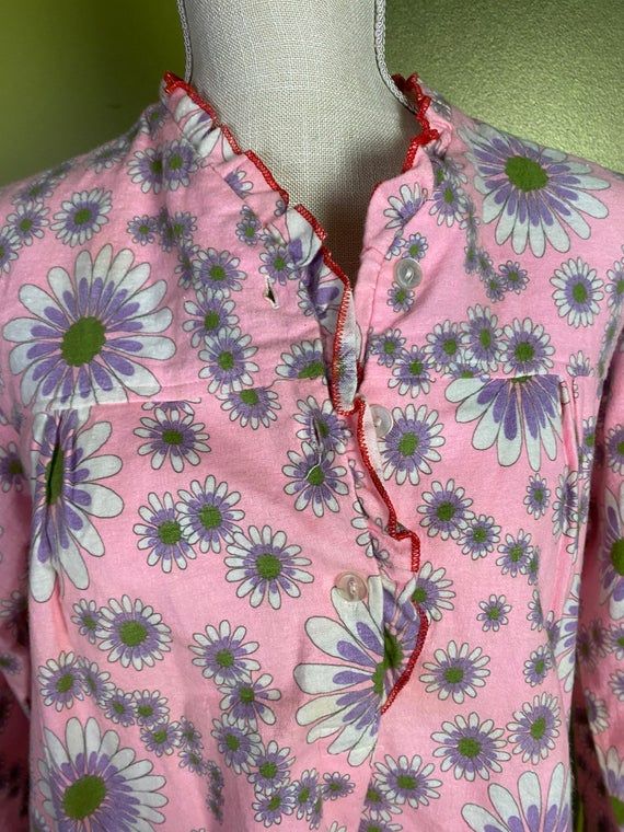 1960’s/70’s pink flannel long sleeve nightgown with white, green and purple flowers. Has a few buttons near the neckline. Red piping around the collarSize large or smallerMax bust: 40”Max hips: 46”Shoulder to hem: 47” Long Sleeve Night Gown, Long Sleeve Nightgown, Pink Flannel, Peignoir Sets, Women's Nightgowns, Satin Slip, Nightgowns, Vintage 1960s, True Vintage