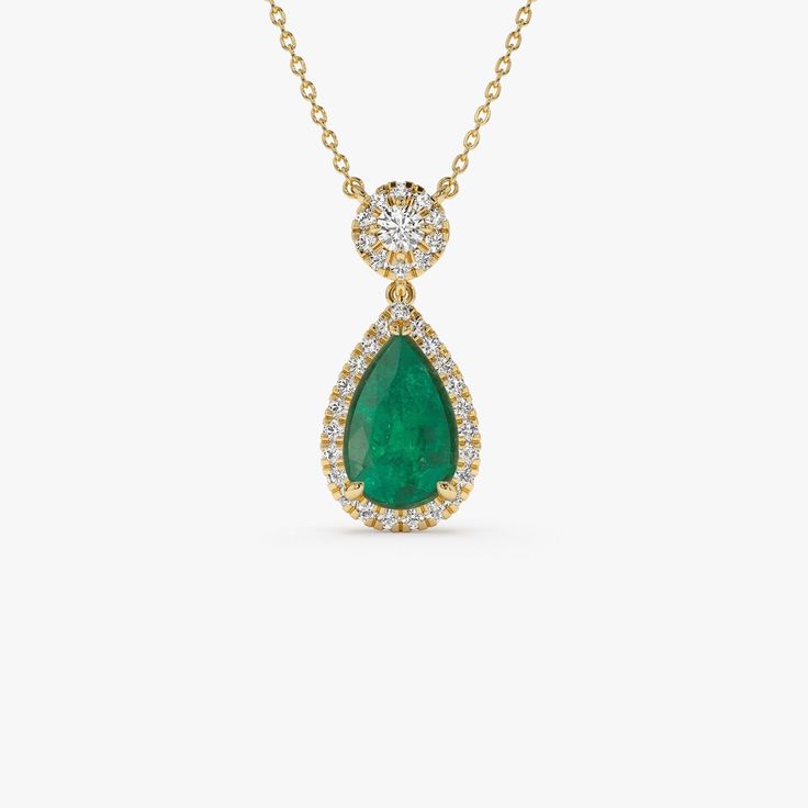 Dive into our statement emerald necklace, crafted with real 14k solid gold and featuring a 2 carat teardrop emerald that's like a treasure from the deep, wrapped in a halo of twinkling diamonds. This pear-shaped emerald piece is a unique find, reminiscent of a precious gem plucked from a sunken pirate chest, designed to make waves with its stunning design. The halo of diamonds around the emerald shines like sunlight piercing through the ocean's surface, adding an extra splash of dazzle. Perfect Emerald Drop Necklace For Formal Occasions, Formal Drop Emerald Gemstone Necklace, Drop Emerald Necklaces For Formal Occasions, Formal Drop Emerald Necklace, Fine Jewelry Emerald Teardrop Necklace For Anniversary, Fine Jewelry Teardrop Emerald Necklace For Anniversary, Teardrop Emerald Gemstone Necklace For Formal Occasions, Fine Jewelry Emerald Teardrop Pendant Necklace For Anniversary, Yellow Gold Teardrop Emerald Necklace For Formal