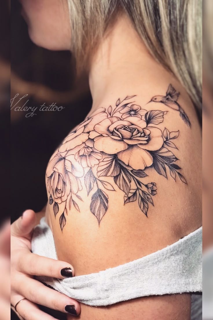 a woman's breast with flowers on it