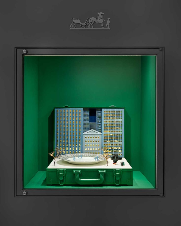 a model of a city in a green case