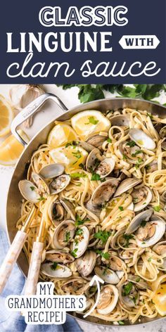 a pan filled with clams and lemons on top of a blue table cloth