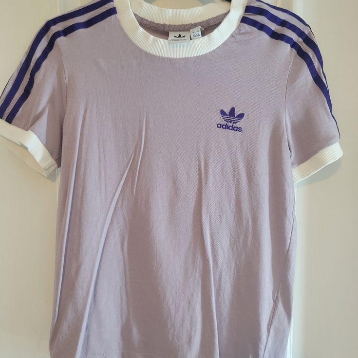 Brand New Adidas Women's T-Shirt. Origal Tag Fell Off But Item Has Never Been Used. Basic Crew Neck T-shirt With Three Stripes, Adidas Three Stripes T-shirt For Spring, Casual Summer T-shirt With Three Stripes, Casual T-shirt With Three Stripes Branding For Spring, Trendy Adidas T-shirt With Letter Print, Summer Relaxed Fit T-shirt With Three Stripes Branding, Cotton Crew Neck Tops With Three Stripes Branding, Relaxed Fit T-shirt For Summer, Relaxed Fit Short Sleeve Tops With Three Stripes