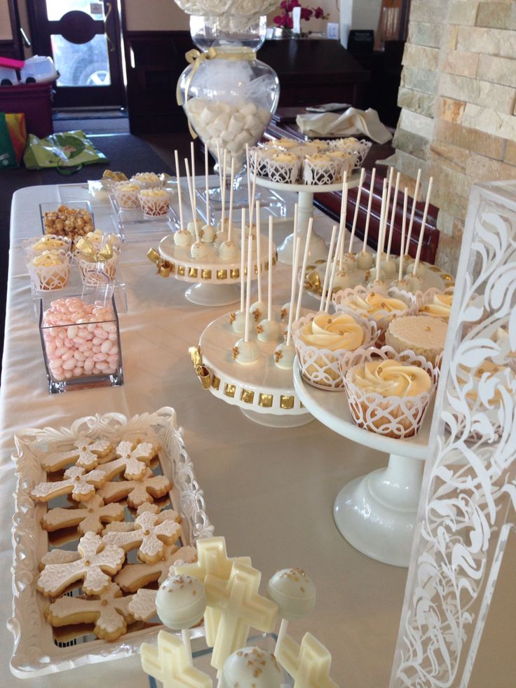 an assortment of desserts are displayed on a table