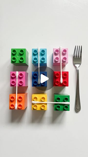 legos with forks and spoon sitting on top of each other