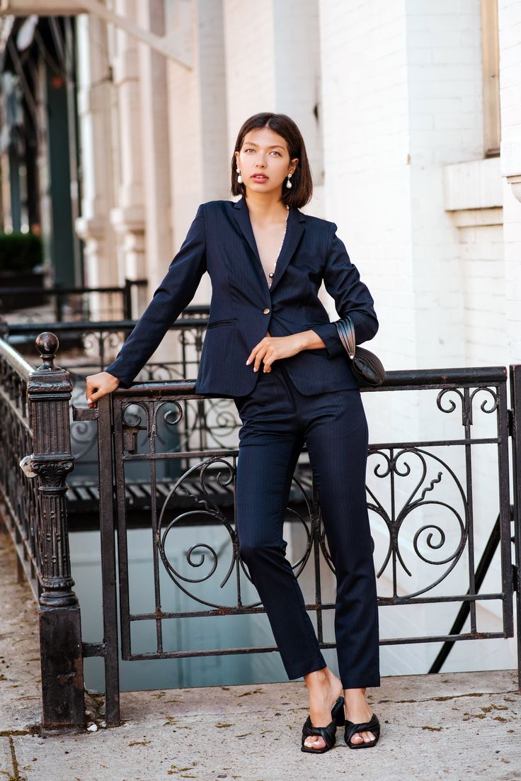 This 100% wool jacket is essential to any work wardrobe. It’s chic and classy, while remaining low-key. Pair with navy trousers or a pencil skirt for the perfect business outfit that’s sure to turn heads. Made in America with high-quality wool fabric, this piece is a must-have in your closet. Color: NavyLength: 23 inchesMade in AmericaCare: Dry CleanComposition: 100% WoolSizing: • Fits true to size • Designed for a regular fit • Mid-weight, non-stretchy fabric • Model is 5ft 10in/ 177.8 cm, and Cheap Navy Long Sleeve Blazer, Navy Trousers, Navy Outfit, Travel Clothes Women, Business Outfit, A Pencil, Work Wardrobe, Professional Outfits, Sweater Set