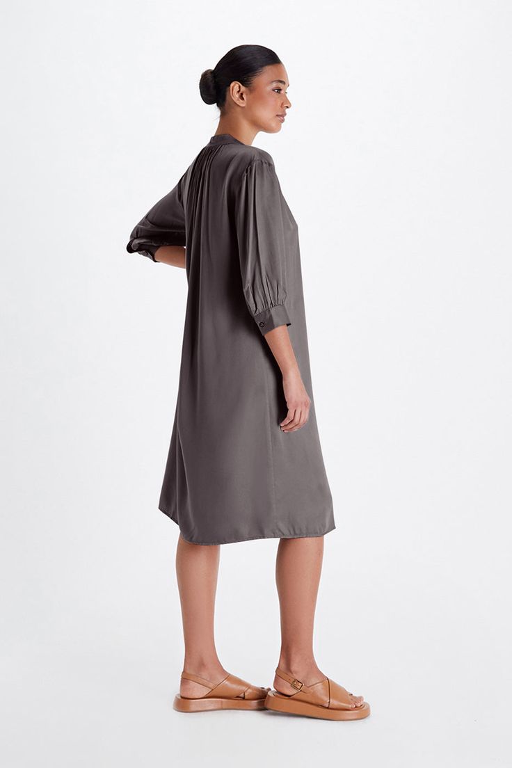 Design Details Care Size & Fit Timeless and elegant, this dress will have you covered from day to night. The dress includes a belt that can be worn or styled without. Crafted from our lightweight, ultra soft and breathable, our Tencel is made from Lenzing Modal®, sourced from European beechwood trees, harvested from sustainably managed forests. Machine wash cold Hang dry or lay flat to dry Dry Clean Optional Easy relaxed fit, take your normal size 100% TENCEL™ Modal Biodegradable mother of pearl Elegant V-neck Relaxed Fit Shirt Dress, Belted Relaxed Fit Dress For Fall, Relaxed Fit Belted Dress For Fall, Fall Relaxed Fit Belted Dress, Silk Dress With Belted Cuffs, Elegant Flowy Shirt Dress For Daywear, Elegant Relaxed Fit Midi Dress For Work, Elegant Formal Dresses With Relaxed Fit, Relaxed Fit Viscose Dress For Work