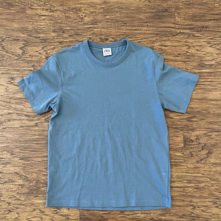 Nwot Zara Heavyweight Basic T Shirt. Model Picture Is To Show The Fit. Color Is A Light Blue Blue Pre-shrunk T-shirt For Everyday, Basic Blue Pre-shrunk T-shirt, Light Blue Basic Cotton Top, Basic Light Blue Cotton Tops, Blue Cotton Graphic Tee Shirt, Blue Cotton Graphic Tee, Pre-shrunk Blue Crew Neck T-shirt, Washed Blue Cotton Crew Neck T-shirt, Zara Casual T-shirt With Relaxed Fit