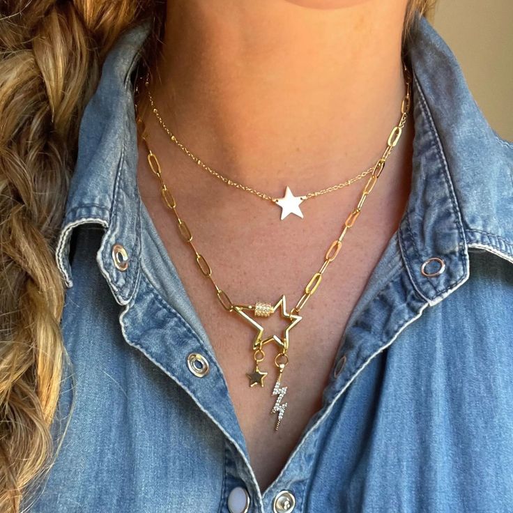 Inspired by you. Create your own story and personalize your Star Charm Necklace! This beauty is handcrafted from gold-filled chain material that will last a lifetime & the star clasp is dipped to perfection in 24k gold. The best accessories are the ones that let you be who you are; this piece is Fully Customizable, allowing you to add any unique charms that suit you. Features: Gold-Filled: Revel in the richness of real gold or silver, with exceptional durability compared to plating. Worry-Free E 14k Gold Necklace With Star Charm, Trendy Star Charm Chain Necklace Gift, Gold Star-shaped Jewelry, Trendy Chain Necklace With Star Charm Gift, Everyday Star Necklace With Adjustable Chain, Everyday Star-shaped Jewelry With Charms, Trendy Gold Star Jewelry, Everyday Yellow Gold Necklace With Star Charm, Everyday Gold Plated Charm Necklace With Star Charm