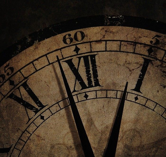 an old clock with roman numerals and numbers on it's face shows the time