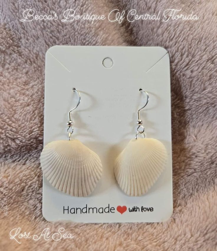 Explore and find your treasure awaiting. They one of a kind natural  shells earrings are going to light up your world. Theses unique earrings are the perfect beach trip accessory. Shell-shaped Jewelry With Matching Earrings For The Beach, Handmade Shell Earrings For Summer, Shell Drop Earrings Jewelry Set, Coastal Style Shell Jewelry For Gifts, Shell Drop Earrings With Matching Set, Coastal Style Shell Jewelry Gift, Coastal Style Shell Shaped Jewelry For Gifts, Sterling Silver Shell-shaped Gift, Handmade Adjustable Ocean-inspired Earrings