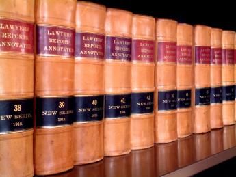 rows of law books lined up on a shelf