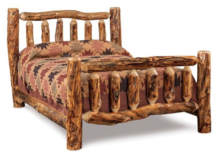 a log bed frame made out of logs with a quilt on the bottom and sides