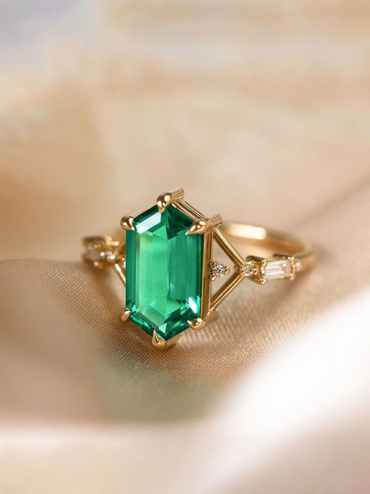 #hiddenspacejewelry #taurus #gemini #emeraldengagementring #weddingringset #uniquejewelry #diamondalternative #emeraldring #artdeco #summertime Timeless Green Baguette Cut Ring, Timeless Green Jewelry With Baguette Diamonds, Timeless Asscher Cut Green Emerald Ring, Proposal Green Emerald Ring, Timeless Emerald Ring With Radiant Cut, Timeless Green Baguette-cut Emerald Ring, Timeless Green Baguette Cut Emerald Ring, Timeless Baguette Cut Green Emerald Ring, Modern Emerald Rings With Baguette Cut