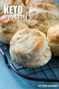 some biscuits on a cooling rack with the words keto biscuits over it