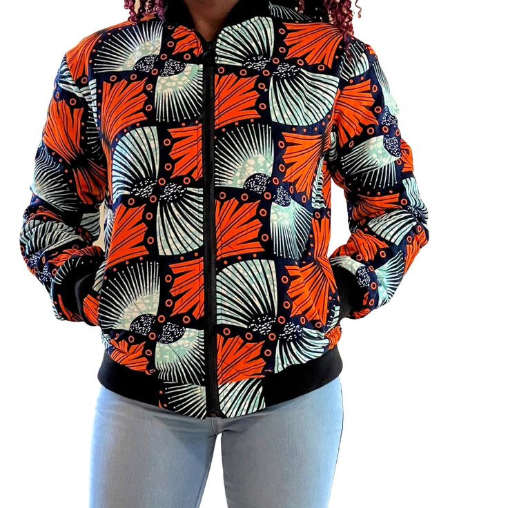 Colorful Stunning African print Unisex Bomber Jacket elevates any outfit making it stand out. You can wear it during the cold days like Spring or Autumn .  style it with jeans/ other plain pants  or up trend the bomber by leaving the jeans behind and going for a cool, clean casual look. Handmade with 100% cotton African Print fabric yarn, fully lined, one inside pocket, two twin pockets on the side, front zip and Elastic trimings Available in two sizes, Small/Medium fits both small and medium si Black Printed Cotton Outerwear, Casual Long Sleeve Printed Outerwear, Casual Cotton Printed Outerwear, Casual Printed Cotton Outerwear, Printed Cotton Outerwear For Fall, Casual Orange Track Jacket For Winter, Printed Cotton Fall Outerwear, Casual Orange Winter Track Jacket, Fall Printed Cotton Outerwear