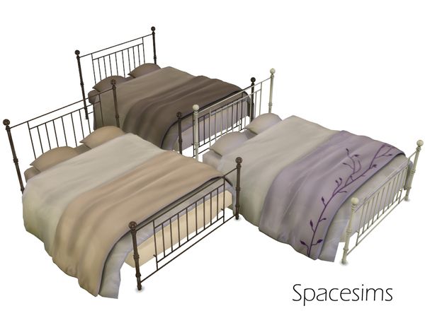 three beds with metal posts and sheets on them, one is made up to look like it