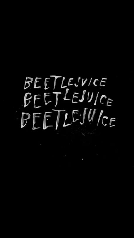 the words beetlejuice written in white on a black background