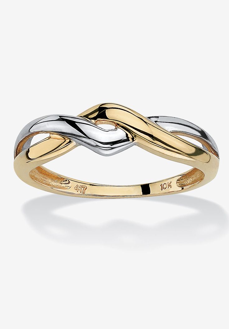 two tone gold and silver ring with twisted design on the front, set against a white background