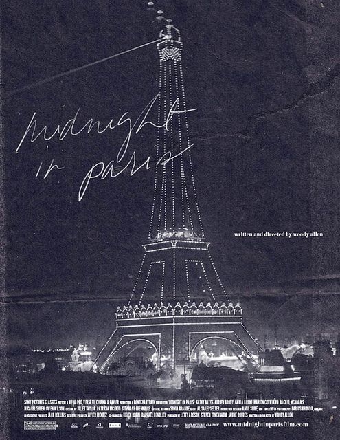 an old photo of the eiffel tower in paris at night with writing on it