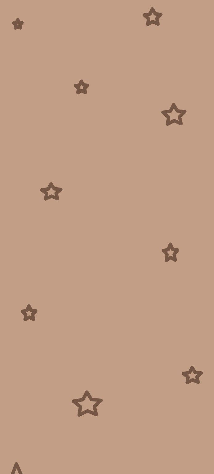 a brown background with small stars on it