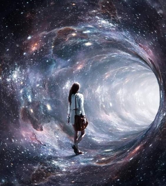 a woman standing in the middle of a space filled with stars