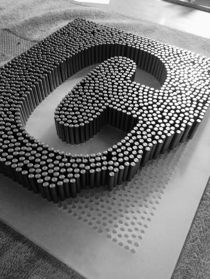 the letter g is made out of bottles