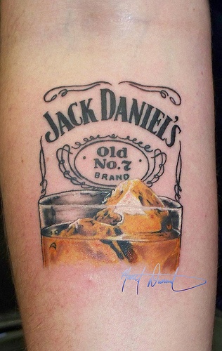 jack daniels tattoo on the arm