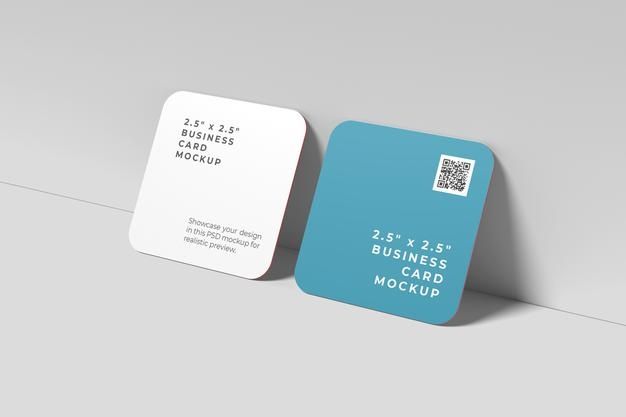 two business cards with qr code printed on the front and back, sitting next to each other