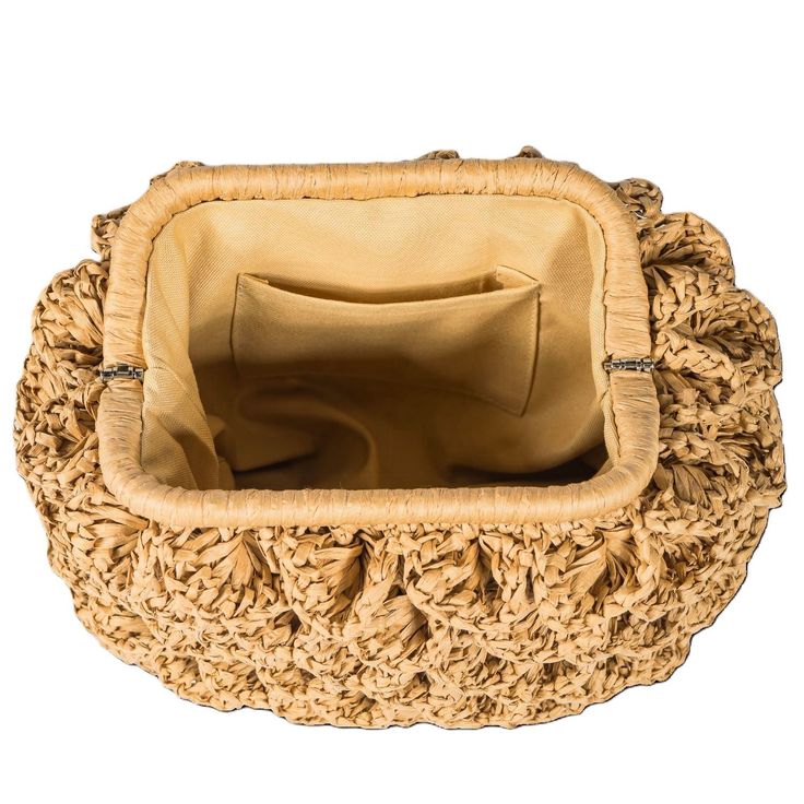 This bag, in the color of coffee with milk, is meticulously handcrafted from raffia yarn. It has a lined interior with pockets for added functionality. Suitable for both day and night use, this bag stands out with its elegant and stylish design. An accessory you'll never want to be without, it combines aesthetic appeal with practicality, making it perfect for everyday use. Width: 30cm Length: 20cm Base: 10cm Raffia yarn Lined interior for added durability and protection Mica handles for a touch Beige Top Handle Bag With Woven Leather, Beige Woven Leather Pouch Bag, Chic Handmade Beige Bucket Bag, Beige Crochet Bag With Woven Leather Top Handle, Chic Brown Straw Bag With Removable Pouch, Beige Crochet Top Handle Bag With Woven Leather, Beige Woven Leather Crossbody Straw Bag, Chic Beige Handmade Bucket Bag, Beige Straw Bag With Woven Leather Top Handle