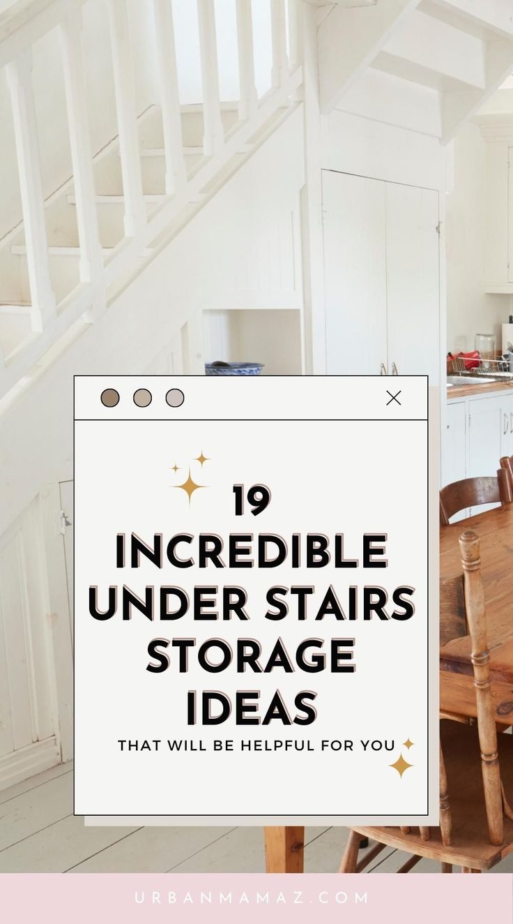 a kitchen with white walls and wooden chairs in front of the stairs that lead up to the second floor