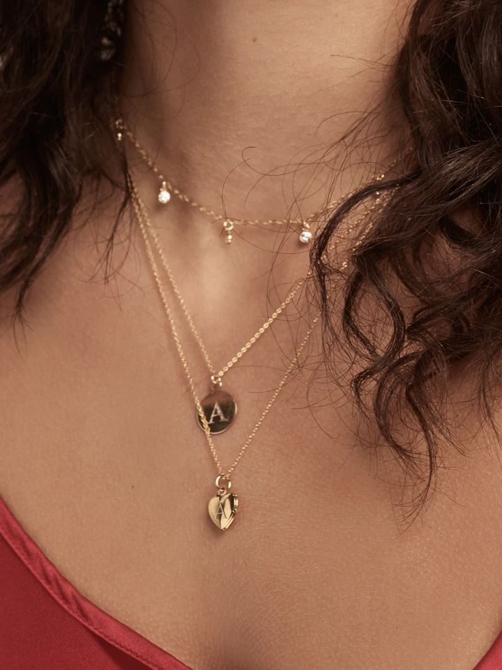 Our necklace is made of dainty  CZ charms dangling from a thin chain.  This is an essential piece to any layer, but is enough as a stand alone piece!Chain measures 14" with a 2" extender for a total length of 16"Gold filled or sterling silver. Tarnish resistant. Jewelry Stacking, Jewelry To Buy, Dangle Necklace, Boho Layering, White Stones, Dangle Necklaces, Buy Necklace, Gold Charm Necklace, Stacked Jewelry