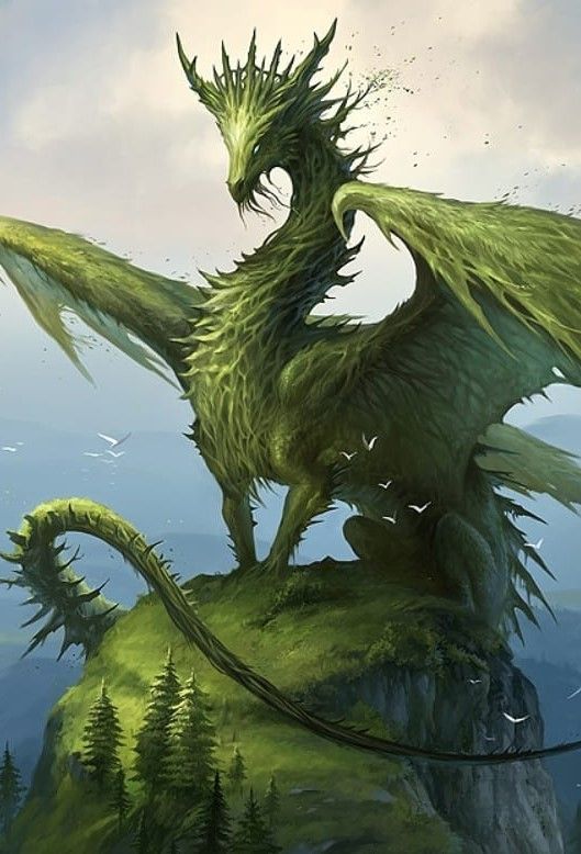 a green dragon sitting on top of a hill