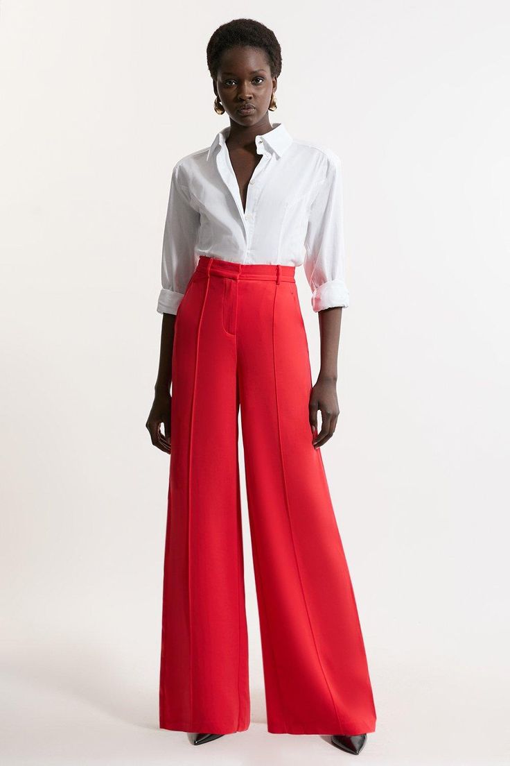 Experience Sleek Tailoring In A Pair Of Wide Leg Trousers, Featuring A Dramatic And Ultra Comfortable Wide Leg Fit And A Comfortable High Waistline. Style It With A Shirt, And Heels For A Dressy Look Perfect For Office Days And Formal Events, Then With A T-Shirt And Trainers For A More Laid Back Approach. Premium Woven Viscose Crepe Wide Leg Trouser High Quality Cepe Fabric Comfortable High Waistline Statement Wide Leg Fit Classic Pleat Detailing Pocket Accents Elegant Red Full-length Dress Pants, Elegant Tailored Red Dress Pants, Red High-waisted Dress Pants For Formal, Red High-waisted Dress Pants For Formal Occasions, Red Full Length Formal Dress Pants, Red Wide-leg Evening Pants, Red Wide-leg Pants For Evening, Red Wide-leg Dress Pants For Formal Occasions, Red Wide Leg Dress Pants For Formal Occasions