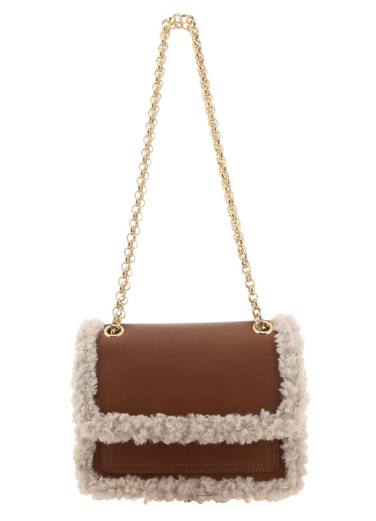 Gorgeous shearling lined handbag with latch closure and a convertible shoulder to a crossbody chain strap with a 12-22" strap drop. This crossbody is the perfect neutral piece to add a little flare to your fall and winter attire. Materials: Polyurethane, polyester; cotton liningDimensions: 8"L, 6"W, 3.5"D Winter Evening Shoulder Bag With Faux Fur Lining, Chic Evening Shoulder Bag With Faux Fur Lining, Brown Crossbody Shoulder Bag For Winter, Brown Winter Crossbody Shoulder Bag, Elegant Evening Shoulder Bag With Faux Fur Lining, Elegant Winter Shoulder Bag With Faux Fur Lining, Chic Evening Shoulder Bag For Winter, Chic Winter Crossbody Shoulder Bag, Chic Winter Shoulder Bag With Faux Fur Lining