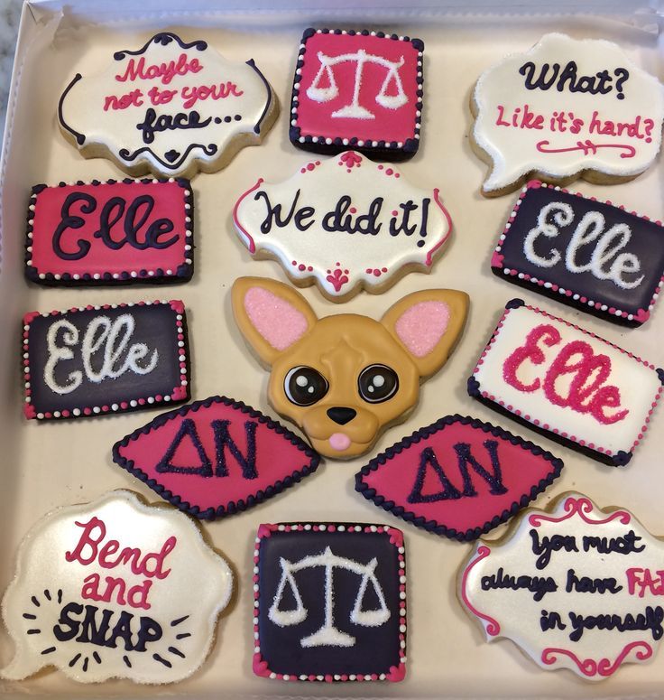 decorated cookies in the shape of law symbols