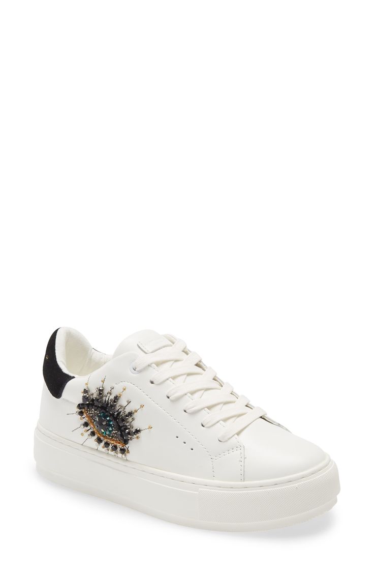 A beaded eye winks at the side of this leather sneaker that's sure to draw stares. Leather upper/synthetic and textile lining/synthetic sole Imported Sporty Embellished Lace-up Sneakers, Embellished Low-top Synthetic Sneakers, Embellished Synthetic Low-top Sneakers, Sporty Embellished Sneakers, Embellished Leather Lace-up Sneakers, Embellished Lace-up Sneakers For Streetwear, Sporty Low-top Embellished Sneakers, Sporty Embellished Low-top Sneakers, Trendy Embellished Sneakers For Streetwear