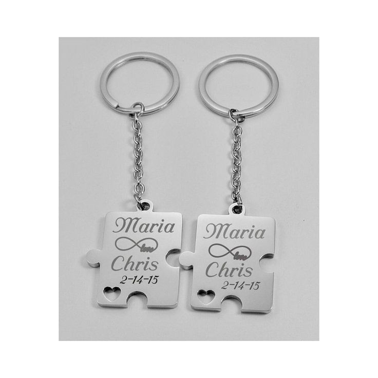 two pieces of puzzle keychain with personalized names on them