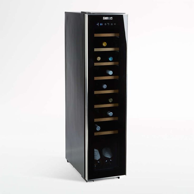 a wine cooler that has several bottles in it