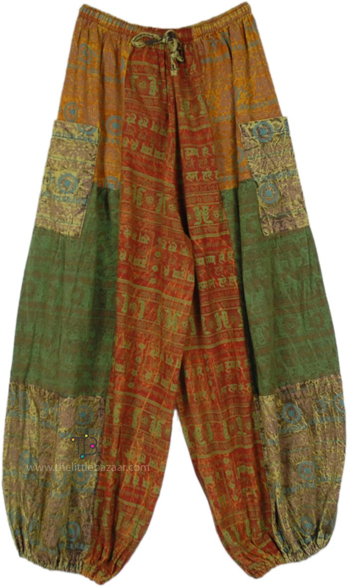 A pair of tropical bohemian handmade hippie print balloon style harem pants.  These pants feature a mesmerizing hippie-inspired print and style that channels the free-spirited vibes of the 60s and 70s. #tlb #SplitSkirtsPants #Patchwork #bohemianfashion #Handmade #Patchworkcottonpants #hippieharempants Green Baggy Harem Pants In Hippie Style, Green Wide Leg Hippie Harem Pants, Baggy Green Hippie Harem Pants, Green Bohemian Harem Pants, Green Bohemian Harem Pants With Loosely Fitted Hips, Multicolor Baggy Harem Pants Hippie Style, Bohemian Green Harem Pants With Loose Fit, Bohemian Green Wide Leg Harem Pants, Bohemian Harem Pants With Loosely Fitted Hips