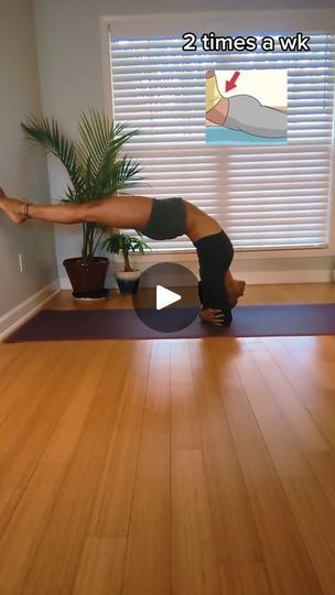 a woman doing a yoga pose in front of a window with the words 2 times a week written on it